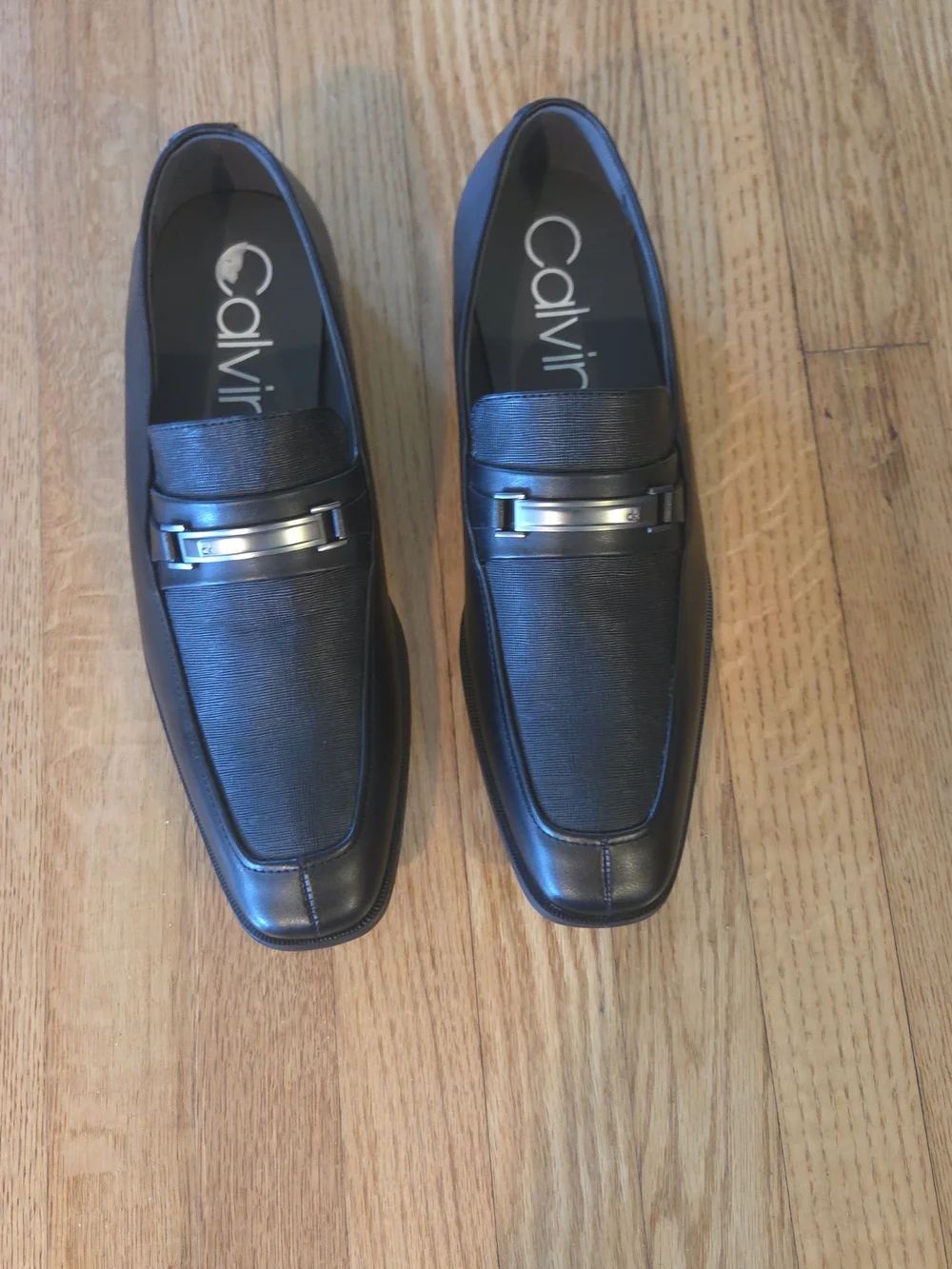 Calvin Klein Men's Black Leather Slip-On Loafers with Silver Bit
